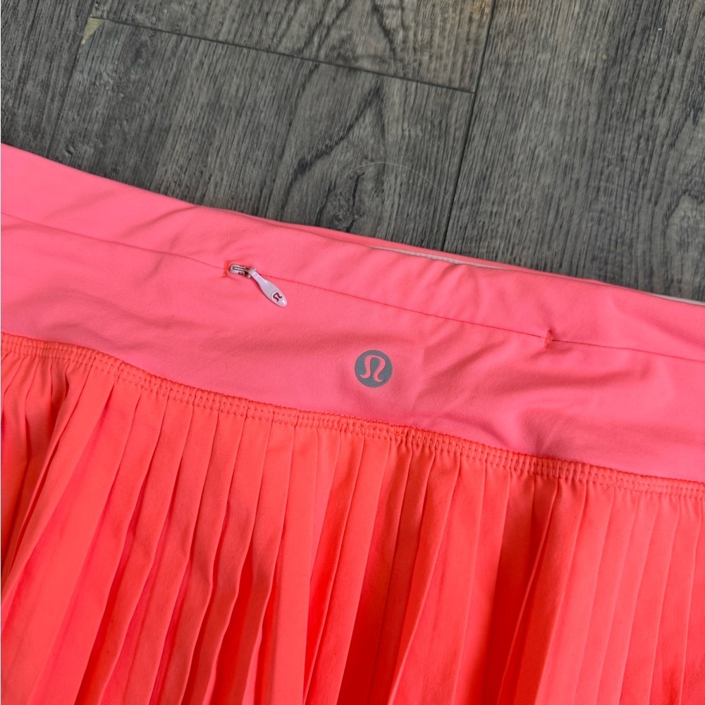 Lululemon Pleat To Street Skirt II- Grapefruit- Size 8 - Picture 9 of 10